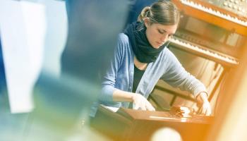 Molly Joyce has found an instrument that enables her to embrace her disability, a vintage electric toy organ. (Photos by Sanjay Suchak, University Communications)