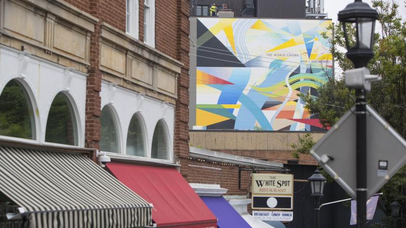 High above University Avenue, the mural is now visible from Grounds, adding a colorful element to the tableau of art and architecture that UVA students and visitors enjoy each day.