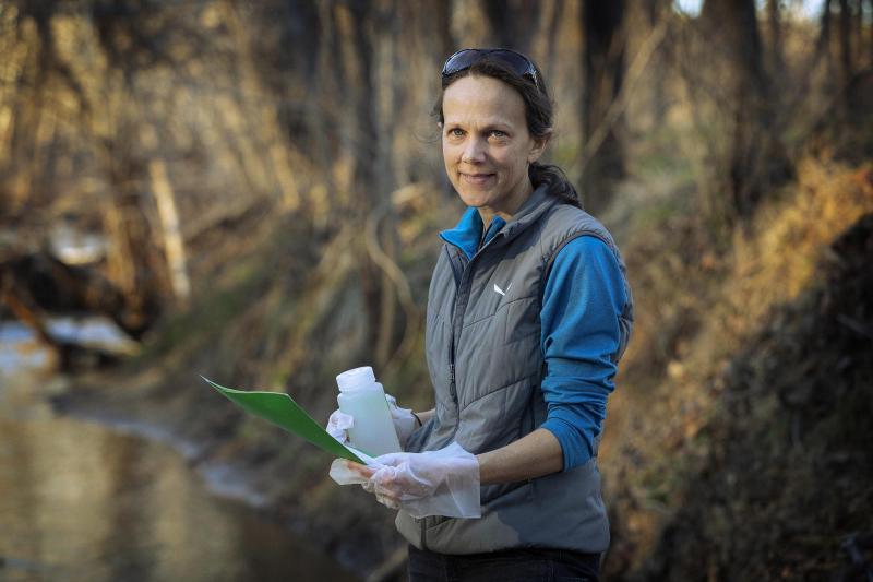 Ami Riscassi, a UVA senior research scientist, will coordinate the collection of hundreds of water samples this spring to help assess the health of the state’s native trout habitats. 