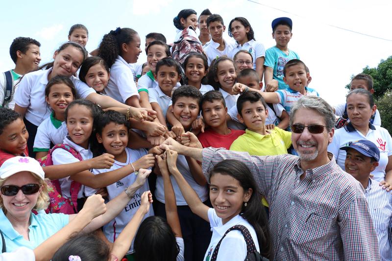 U.S Ambassador to Colombia Kevin Whitaker is greeted by children at Campo Hermoso in the Colombian department of Caquetá, during his recent visit to USAID projects in the area.