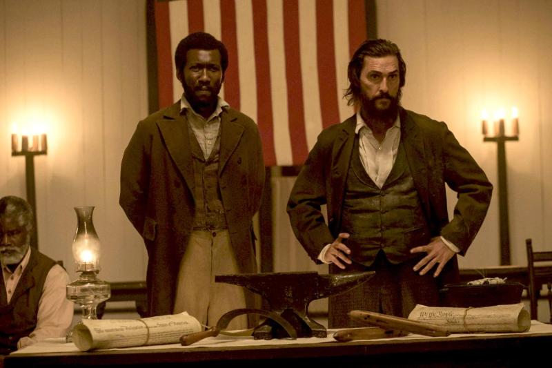 Matthew McConaughey, right, plays a white Mississippi farmer opposed to slavery who leads an uprising against the Confederacy, and Mahershala Ali plays Moses, a runaway slave who helps and joins him.