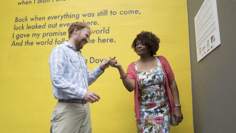During the dedication, Guinn and Dove each signed the mural, putting the finishing touch on the project after two months of painting, and many more hours spent designing and planning the mural.