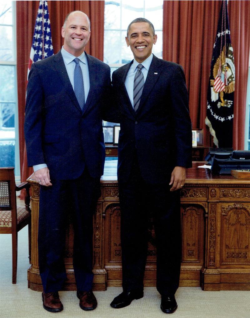 President Obama congratulates former Deputy Assistant Secretary Jerry White in the Oval Office for helping launch the new Bureau of Conflict and Stabilization Operations in 2014.